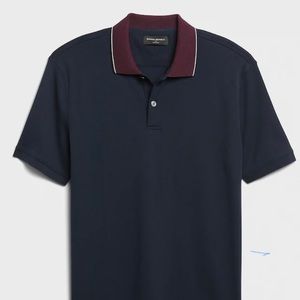 Brand new Men’s dress polo.